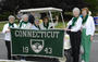 The Class of 1943 donned green feather boas for the parade.<em><span style=font-size:9pt;>&nbsp;Credit: A. Vincent Scarano</span></em>
