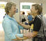 Two alumnae reunite at the Sykes Society Luncheon.<em><span style=font-size:9pt;>&nbsp;Credit: A. Vincent Scarano</span></em>
