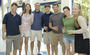 Alumni pose for a photo at a wine tasting.<em><span style=font-size:9pt;>&nbsp;Credit: A. Vincent Scarano</span></em>