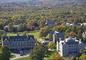 An aerial view of the campus from the main entrance, looking west.