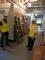 Engineers confer in a hallway.