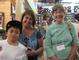 Caleb Brown, Lisa Rinaldi Brown ’79 and Ellen Smith ’57 check out the Red Sox team store.