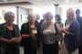 Pausing for a photo at a reception in Maine this summer.