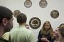The class of 2011 gathered in Fanning Hall during Fall Weekend to unveil their class gift, a display of bronze plaques showing the evolution of the College seal over the years.