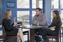David M. Brown '02 and Elizabeth Kennedy '04 talk with a student at the Seminar on Success.
