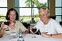 Susan Melinette Haerle '67 and Nancy Stone '67 enjoy a Meet the Faculty event with Ronald J.O. Flores, associate professor of sociology.