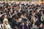 Graduates celebrate at Commencement 2012.<em><span style=font-size:9pt;>&nbsp;Credit: Bob MacDonnell</span></em>