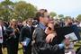 Graduates hug after Commencement 2012.<em><span style=font-size:9pt;>&nbsp;Credit: Bob MacDonnell</span></em>