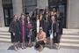 Professor of Dance David Dorfman poses with graduates.<em><span style=font-size:9pt;>&nbsp;Credit: Jon Crispin</span></em>