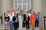 The Class of 1957 gathers for their class photo before their reception and dinner at the Lyman Allyn Art Museum.