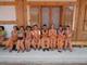 Molly Resnick '14 and her CLS classmates in front of the building where they stayed at  Woljeongsa Temple in Pyeong Chang. She says they made Buddhist prayer beads. "Every time you put a bead on the string you must do a bow. There are 108 beads on the necklace!"