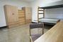 Modern and functional wardrobes replaced the old built-in wardrobes in Larrabee House, as seen in this Larrabee triple.<em><span style=font-size:9pt;>&nbsp;Credit: Photo by Bob MacDonnell</span></em>