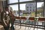 Jim Berrien '74, former chair of the College's Board of Trustees, and Eddie Castell '87, a current trustee, tour the common spaces and enjoy the beautiful vistas from the Science Center at New London Hall. 