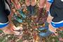 The team came prepared with waterproof footwear for the cool, blustery weather they experienced on Sunday.
