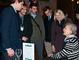 Jan Evans Houser ’54 P’80, who hosted the holiday party in Washington, D.C., is thanked by members of the Connecticut College community who attended the event. 