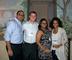 Ivan Tatis ’10, Kevin Nally ’10, Aidyn Urena ’10 and Kirsten Frazer ’10 enjoy catching up at the New York City holiday party.  