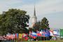 Flags representing the nations of the College’s students fly proudly on Tempel Green during Fall Weekend. More than 2,000 alumni, parents and friends visited campus.