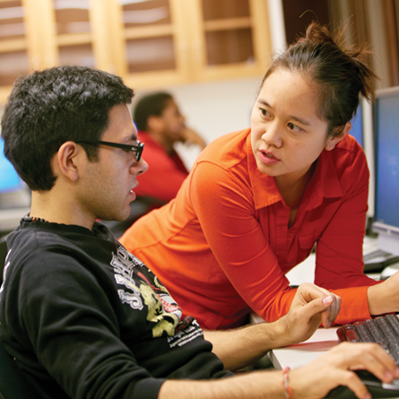 Christine Chung, Tempel Professor of Computer Science, works with a student.