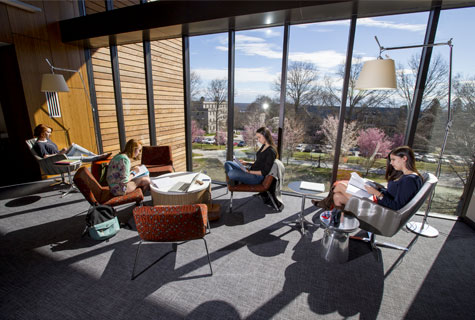 A group of students sitting in Shain Library.