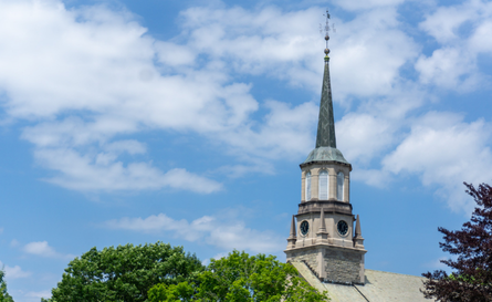 The chapel spire extending into the sky.
