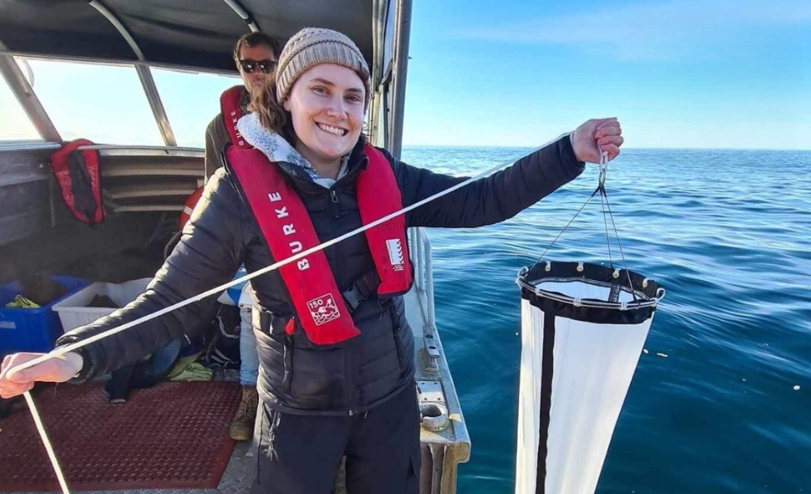 Grace Robinson ’24 with fishing equipment.