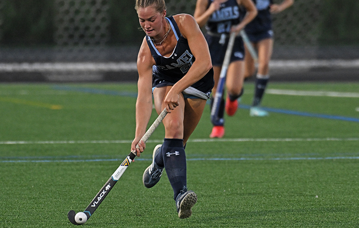 The Field Hockey team playing against Wellsley.