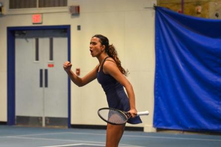 Sana Bhat celebrating playing tennis.