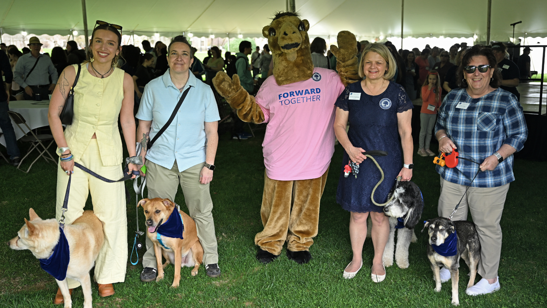 President Chapdelaine posing with the dogs of Indoguration.