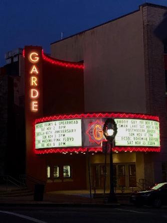 Outside The Garde Arts Center, which has a lit up marquee