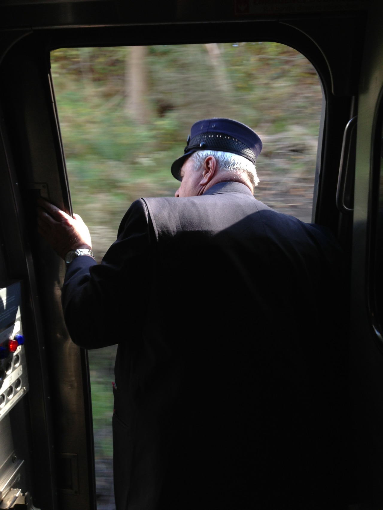 Photo of a train conductor