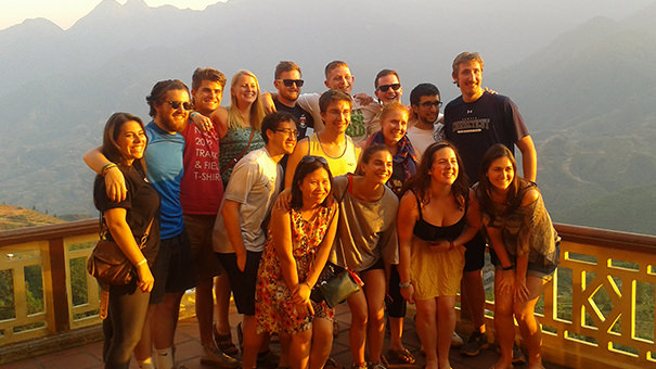 Government and International Relations students pose at a site abroad. 