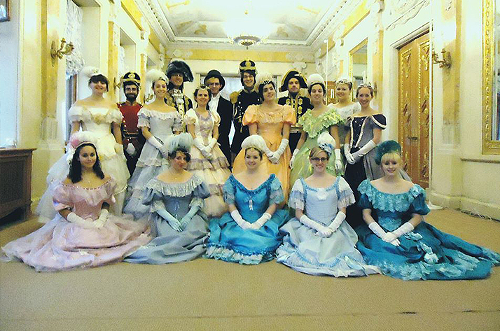 A group of students in traditional historic Russian clothing.