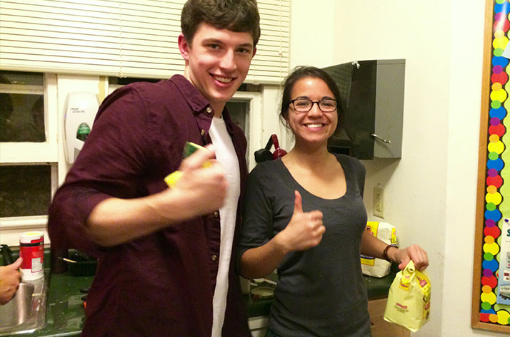 Two Slavic Studies students cooking Russian food. 