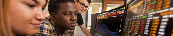 students looking at a computer