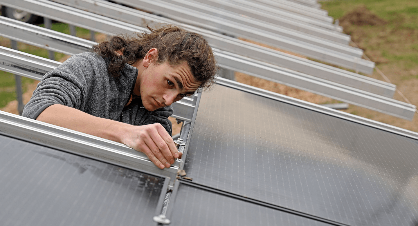 Student Working on roof