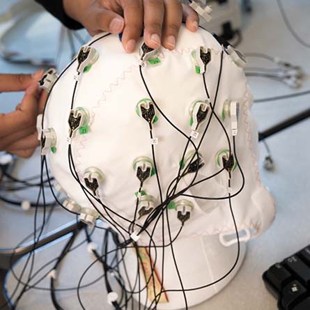 Researchers set up a head cap to monitor brain neurons