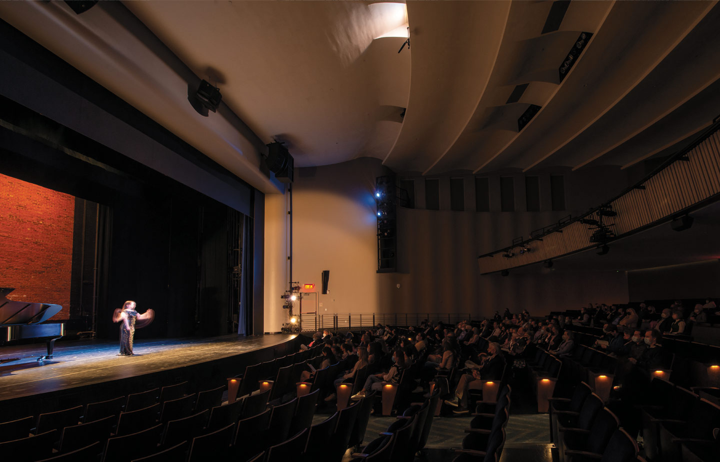 View of performer on stage at new Athey Center