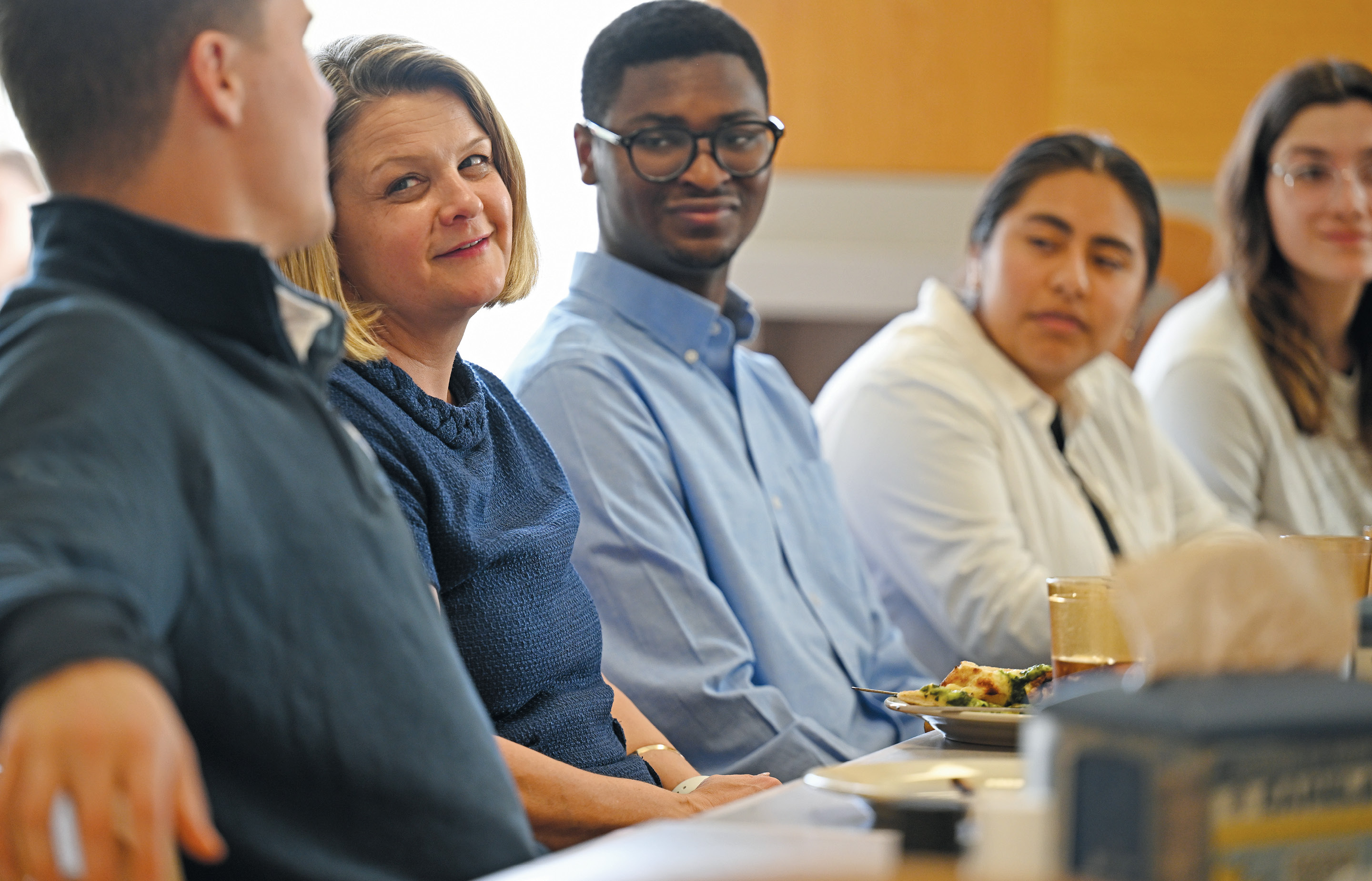 Image of President Chapdelaine talking to students at Harris