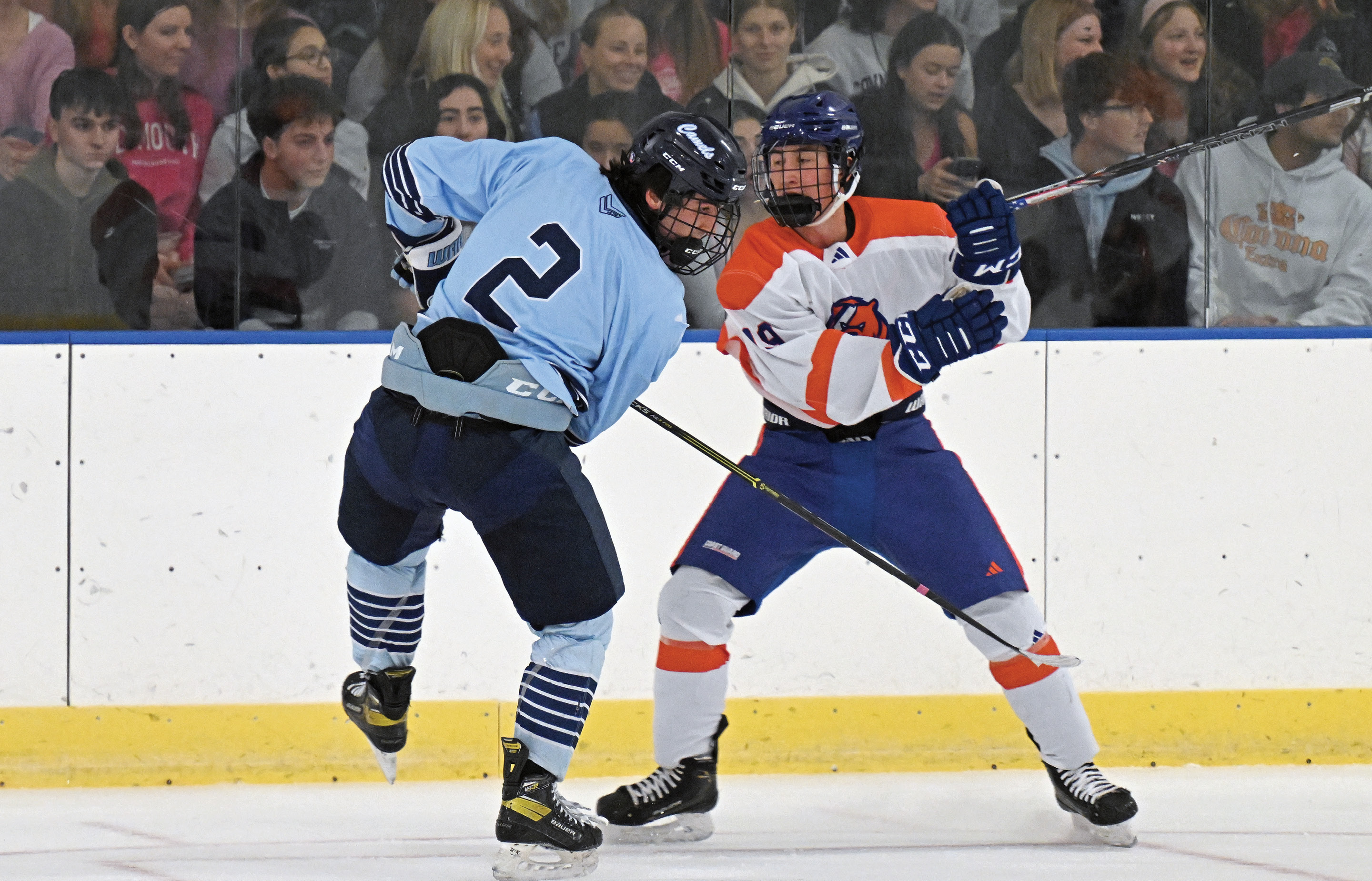 Aidan Trainor '26 faces an opponent on the ice at Dayton Arena,