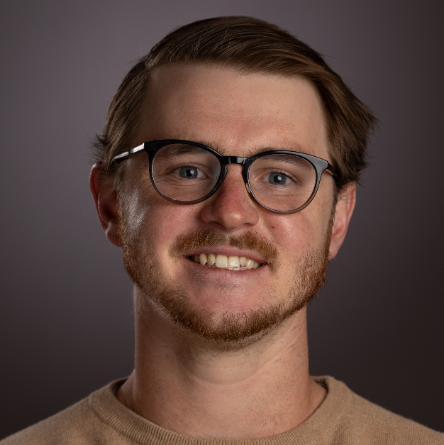 a headshot of Tyler