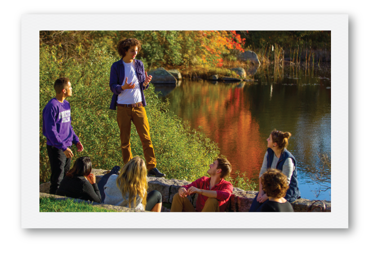 Polaroid of students discussing in autumn Arboretum