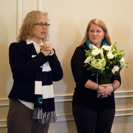 Green Dot Executive Director Dorothy Edwards speaks at a Green Dot Week reception as Darcie Folsom, Connecticut College’s director of sexual violence prevention and advocacy, looks on.