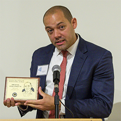 Dwayne Stallings '99 accepts his induction in the Connecticut College Athletic Hall of Fame