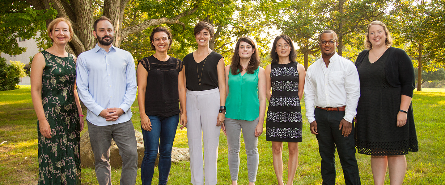 A photo of all eight new faculty members