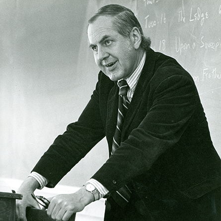 An archival photo of William Meredith teaching at Connecticut College