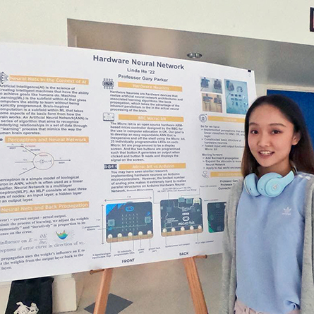 Linda He '22 presents research she conducted over the summer with Professor of Computer Science Gary Parker at the annual Summer Science Institute poster symposium Oct. 5. 