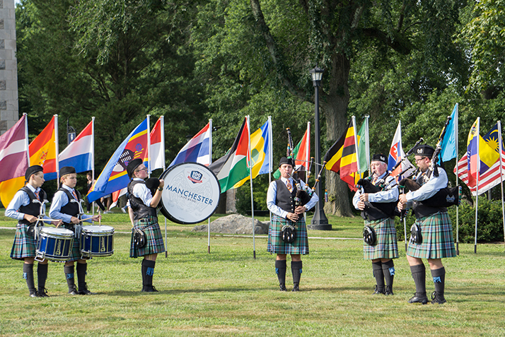 The Manchester Pipe Band plays as students and faculty process into the Convocation ceremony