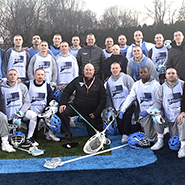 Men's lacrosse players and coaches after shaving their heads for Lacrosse for Life.