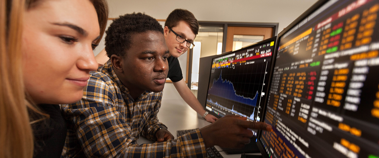 Madeline Stavis ’21, Bailor Jalloh ’23 and Jonathan Fraga ’23 check out the new Bloomberg Terminal.