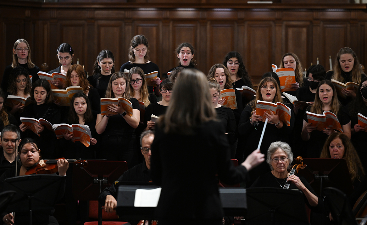Rachel Feldman directs the Connecticut College Camerata and Connecticut College Chorale during An Advent Gathering: All Shall Be Well.